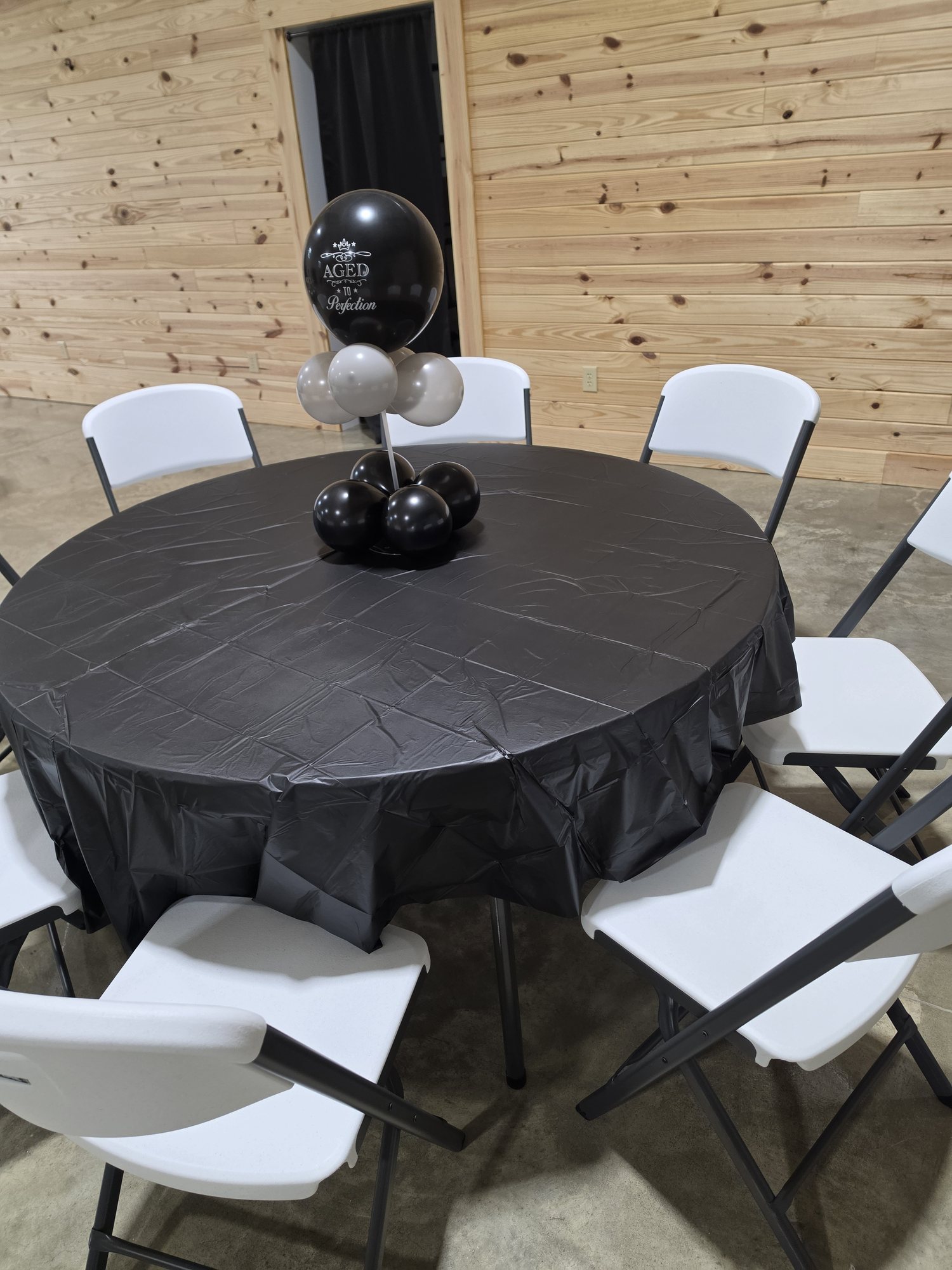 A birthday table arrangement using The Landing’s tables and chairs