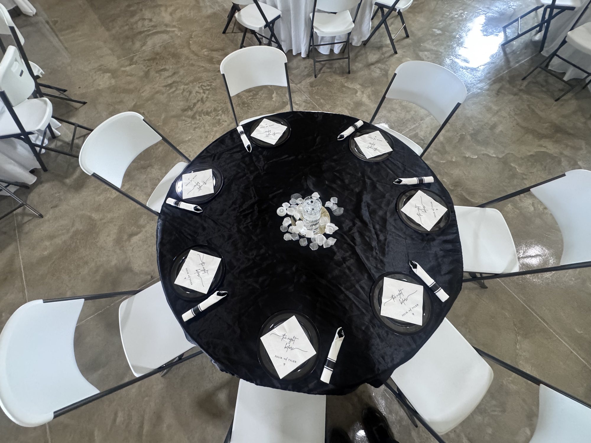 An overhead view of a reception table set inside The Landing